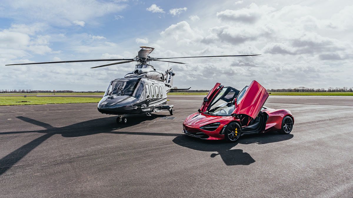 helicopter x moonshot with red luxury car on airstrip