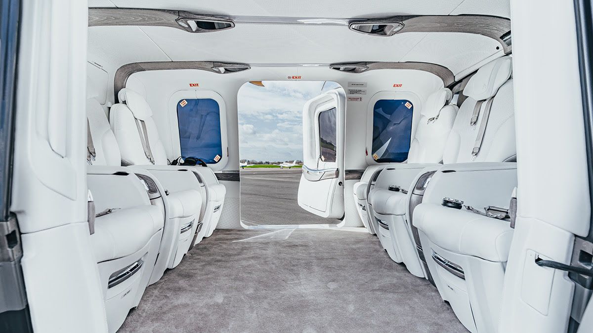 white interior of a helicopter with open door